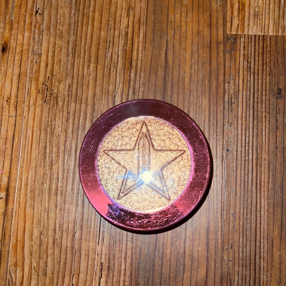 Jeffree star caramel kiss supreme frost highlighter